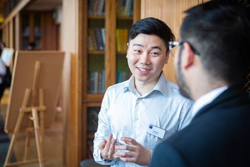 image of student and faculty talking